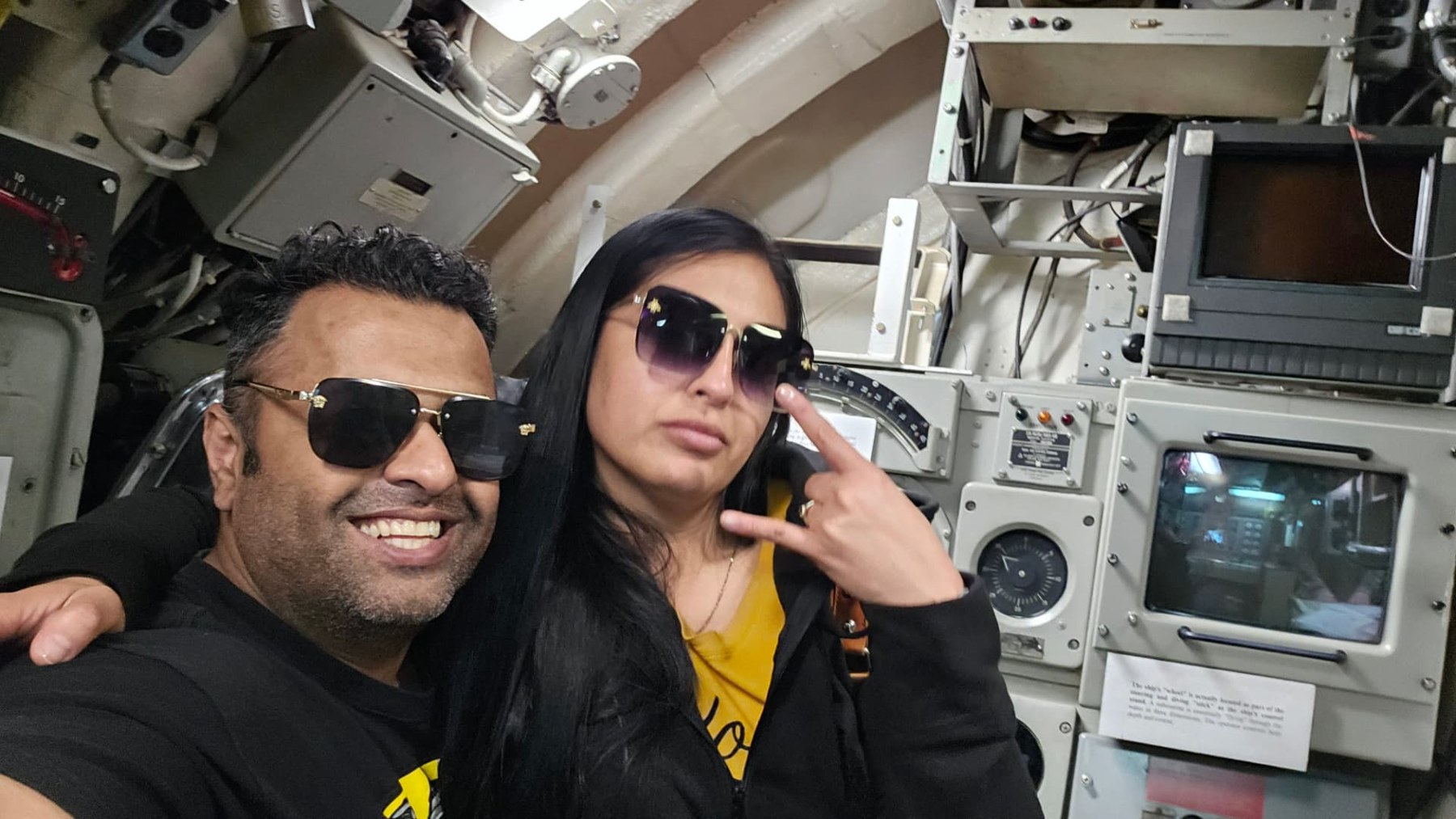 Margarita and Samir exploring an aircraft cockpit