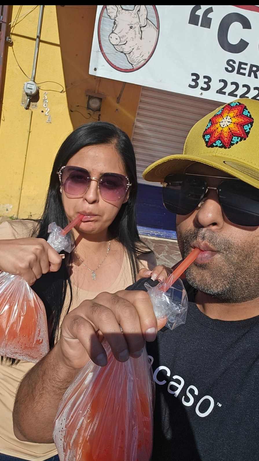 Margarita and Samir sharing drinks and a smile