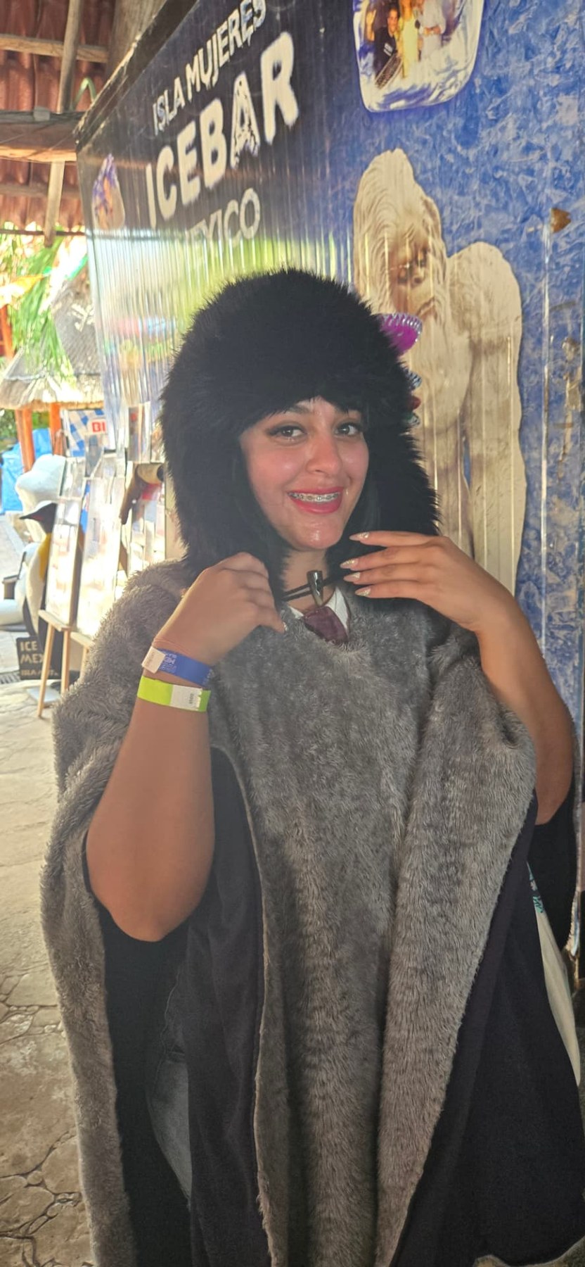 Margarita trying on a playful hat