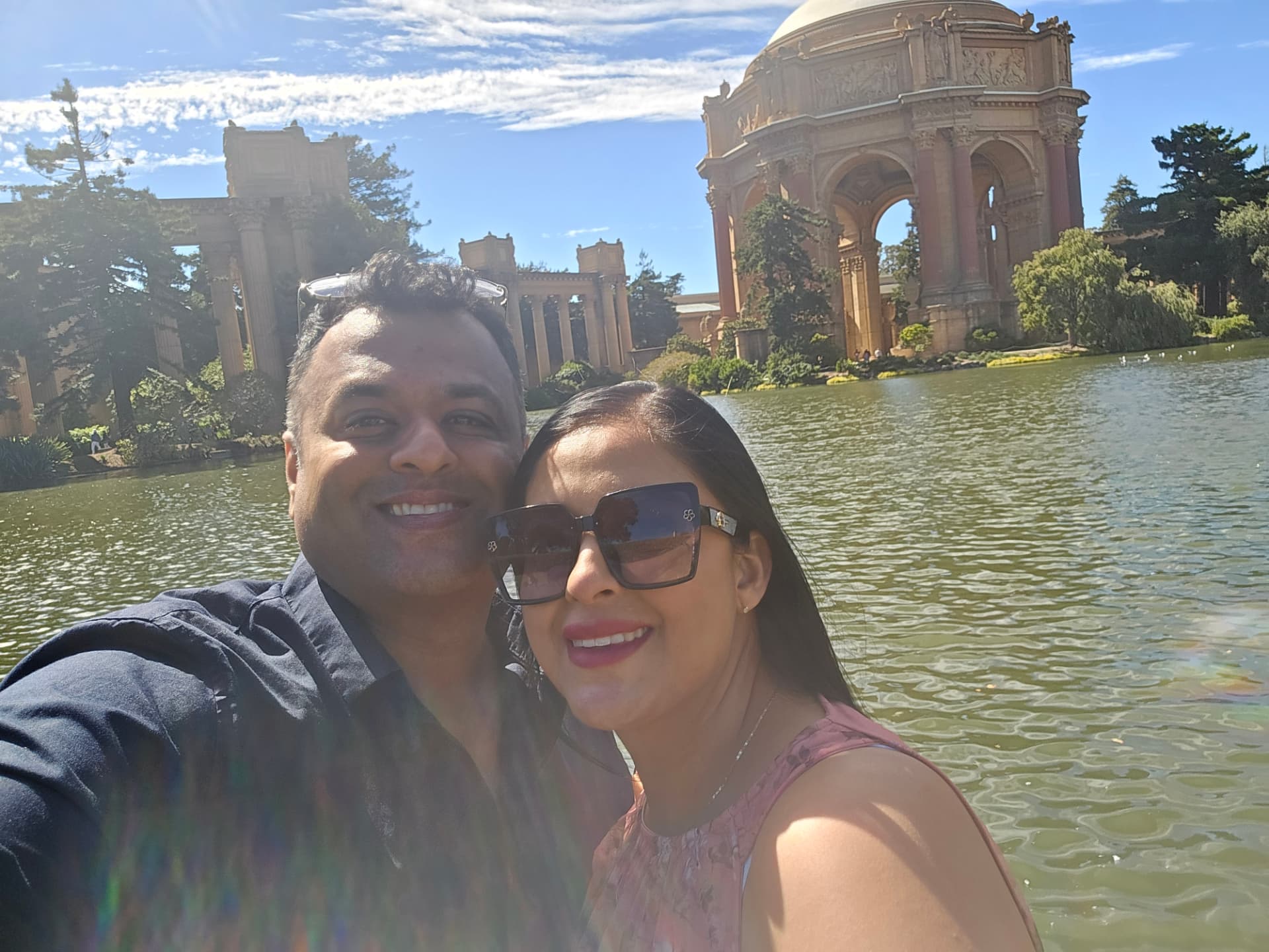 Margarita and Samir taking a selfie at the Palace of Fine Arts in San Francisco